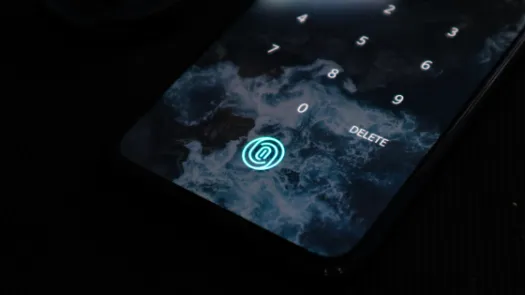 Image of smart phone with smokescreen and fingerprint icon lit up in blue.