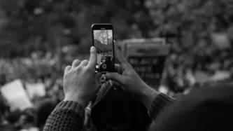 protester wiht phone