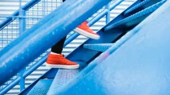 Person walking up steps