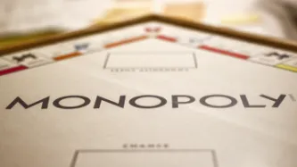 Close up image of text on Monoply board game 